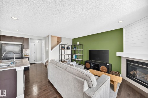 15908 10 Avenue Sw, Edmonton, AB - Indoor Photo Showing Living Room With Fireplace