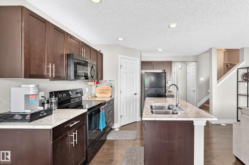 15908 10 Avenue Sw, Edmonton, AB - Indoor Photo Showing Kitchen With Double Sink