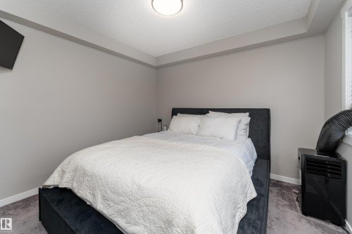 #61A 1530 Tamarack Bv Nw, Edmonton, AB - Indoor Photo Showing Bedroom