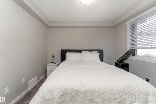 #61A 1530 Tamarack Bv Nw, Edmonton, AB - Indoor Photo Showing Bedroom