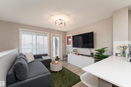 #61A 1530 Tamarack Bv Nw, Edmonton, AB - Indoor Photo Showing Living Room
