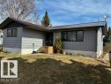 Single-story residence featuring gray siding and a dark metal roof - 5206 51Ave, Willingdon, AB  - Outdoor 