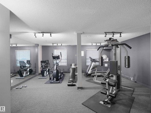 #203 9760 174 St Nw, Edmonton, AB - Indoor Photo Showing Gym Room
