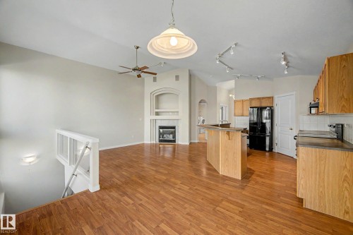 12 Encino Close, St. Albert, AB - Indoor Photo Showing Kitchen With Fireplace