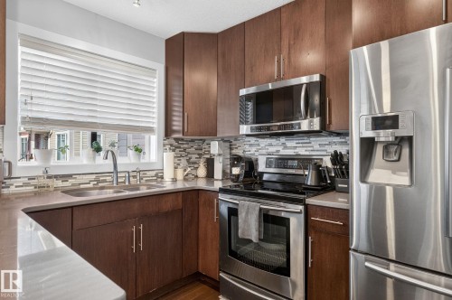 5922 Mullen Way Nw, Edmonton, AB - Indoor Photo Showing Kitchen With Stainless Steel Kitchen With Double Sink