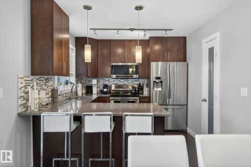 5922 Mullen Way Nw, Edmonton, AB - Indoor Photo Showing Kitchen With Stainless Steel Kitchen With Upgraded Kitchen