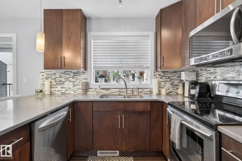 5922 Mullen Way Nw, Edmonton, AB - Indoor Photo Showing Kitchen With Double Sink