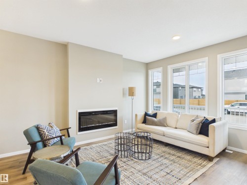 1098 Mcleod Avenue, Spruce Grove, AB - Indoor Photo Showing Living Room With Fireplace