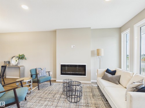 1098 Mcleod Avenue, Spruce Grove, AB - Indoor Photo Showing Living Room With Fireplace