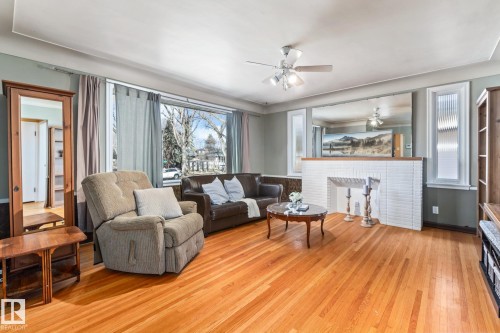 9513 81 Street Nw, Edmonton, AB - Indoor Photo Showing Living Room With Fireplace