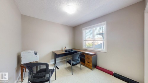 Room with neutral-toned walls, white trim, and light-colored carpet - 335 62 Street Sw, Edmonton, AB - Indoor Photo Showing Office