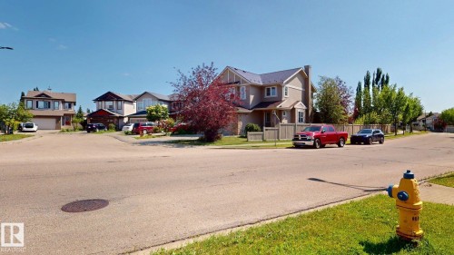 Residential street featuring mature trees and established homes - 335 62 Street Sw, Edmonton, AB - Outdoor With Facade