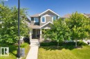 Two-story residence featuring dark green siding and white trim - 1627 167 Street Sw, Edmonton, AB  - Outdoor 
