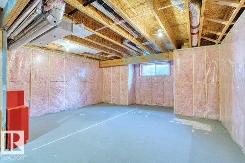 Unfinished basement with exposed ceiling joists and subfloor - 1627 167 Street Sw, Edmonton, AB - Indoor Photo Showing Basement