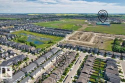 Aerial perspective showcasing a residential community with varied housing styles - 