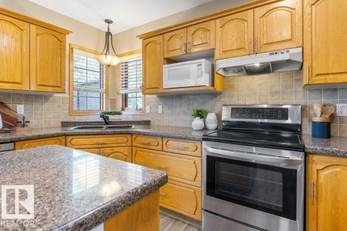 7 Eagle Point(E), St. Albert, AB - Indoor Photo Showing Kitchen With Double Sink