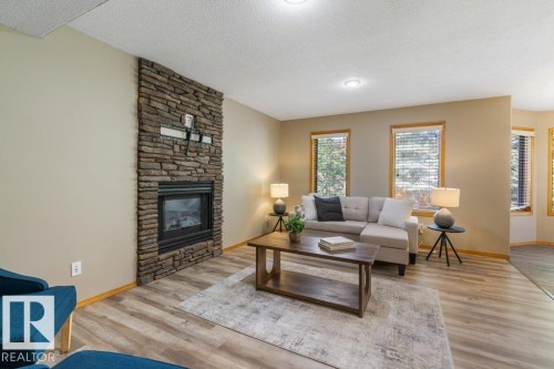 7 Eagle Point(E), St. Albert, AB - Indoor Photo Showing Living Room With Fireplace