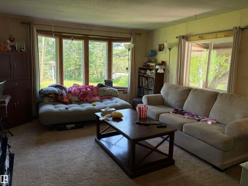 Bay window offering abundant natural light - # 501  11131 Twp Rd 600, Rural St. Paul County, AB - Indoor Photo Showing Living Room
