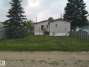 Single-story residence featuring light-colored siding and a covered entry - 5273 50 Street, Mayerthorpe, AB  - Outdoor 