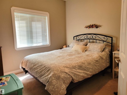 #101 4128 47 St, Drayton Valley, AB - Indoor Photo Showing Bedroom