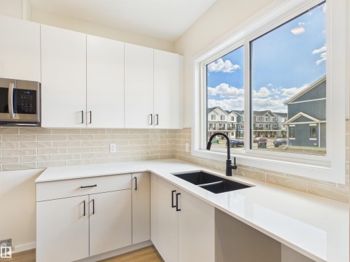 1096 Mcleod Avenue, Spruce Grove, AB - Indoor Photo Showing Kitchen With Double Sink With Upgraded Kitchen