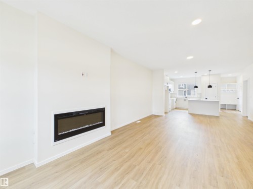 1096 Mcleod Avenue, Spruce Grove, AB - Indoor Photo Showing Living Room With Fireplace