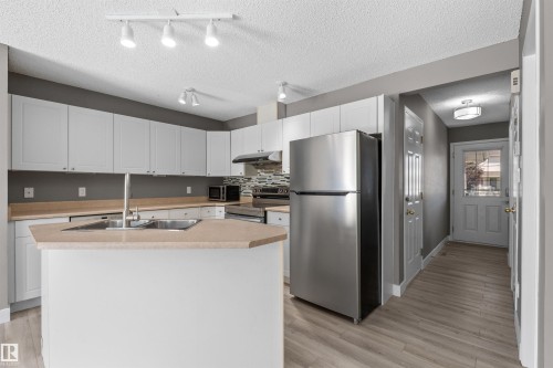 6837 159A Avenue Nw, Edmonton, AB - Indoor Photo Showing Kitchen With Double Sink