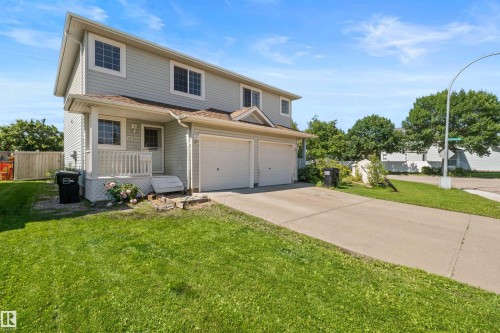 Driveway has been professionally lifted and  new concrete walkway to house has been poured - 6837 159A Avenue Nw, Edmonton, AB - Outdoor