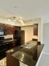 #303 1060 Mcconachie Bv Nw, Edmonton, AB  - Indoor Photo Showing Kitchen With Double Sink 