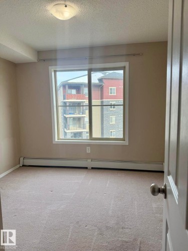 #303 1060 Mcconachie Bv Nw, Edmonton, AB - Indoor Photo Showing Other Room