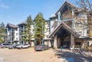 Multi-story residential building featuring a stone and siding exterior - #110 2903 Rabbit Hill Rd Nw, Edmonton, AB  - Outdoor With Facade 