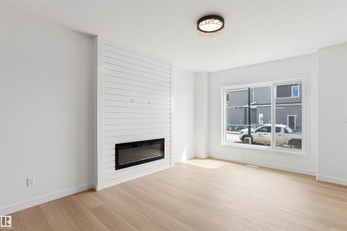 1508 209 Street Nw, Edmonton, AB - Indoor Photo Showing Living Room With Fireplace
