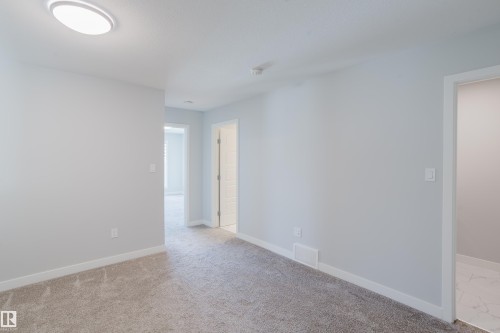 3883 Chrustawka Place Sw, Edmonton, AB - Indoor Photo Showing Other Room