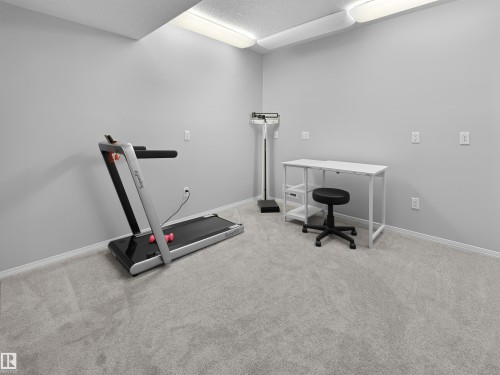 #124 215 Blackburn Dr E Sw, Edmonton, AB - Indoor Photo Showing Gym Room