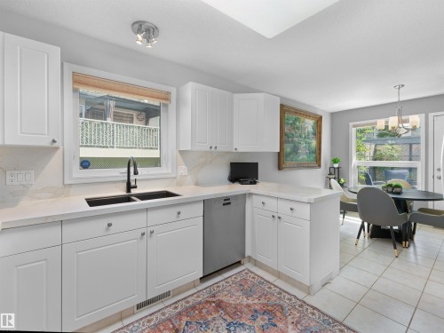 #124 215 Blackburn Dr E Sw, Edmonton, AB - Indoor Photo Showing Kitchen With Double Sink