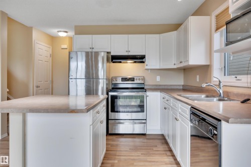 #82 287 Macewan Dr Sw Sw, Edmonton, AB - Indoor Photo Showing Kitchen With Double Sink