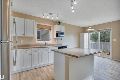 #82 287 Macewan Dr Sw Sw, Edmonton, AB - Indoor Photo Showing Kitchen With Double Sink