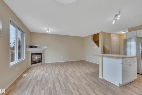 #82 287 Macewan Dr Sw Sw, Edmonton, AB - Indoor With Fireplace
