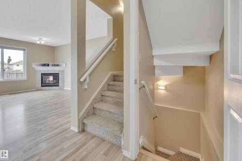 #82 287 Macewan Dr Sw Sw, Edmonton, AB - Indoor Photo Showing Other Room With Fireplace