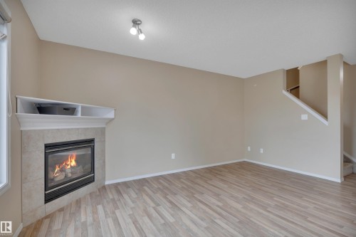 #82 287 Macewan Dr Sw Sw, Edmonton, AB - Indoor With Fireplace