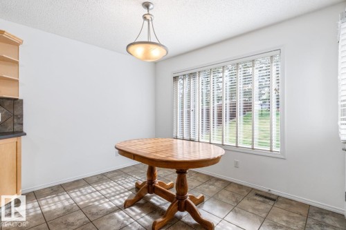 Eating Area With Big Window Looking Into Backyard. - 4717 60 Street, Beaumont, AB 
