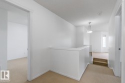 Hallway On The Upper Floor. One Way To The Family Room And The Other To The Bedrooms. - 