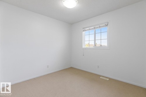 Second Bedroom Upstairs. - 4717 60 Street, Beaumont, AB 