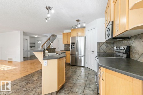 Kitchen With Maple Cabinets. - 4717 60 Street, Beaumont, AB 