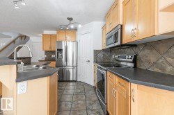 Kitchen With Stainless Steel Appliances. - 