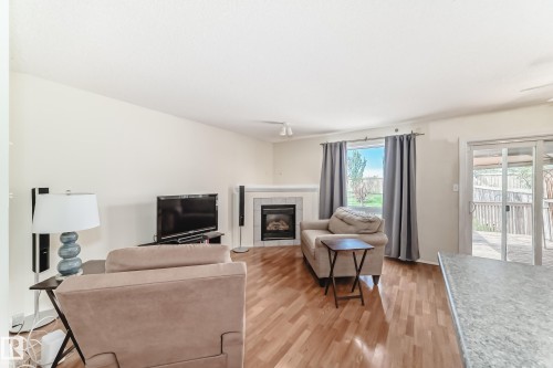 9147 165 Avenue, Edmonton, AB - Indoor Photo Showing Living Room With Fireplace