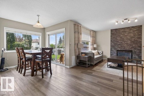 20431 57 Avenue Nw, Edmonton, AB - Indoor Photo Showing Other Room With Fireplace