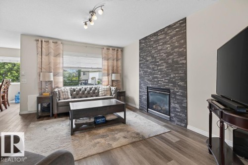 20431 57 Avenue Nw, Edmonton, AB - Indoor Photo Showing Other Room With Fireplace