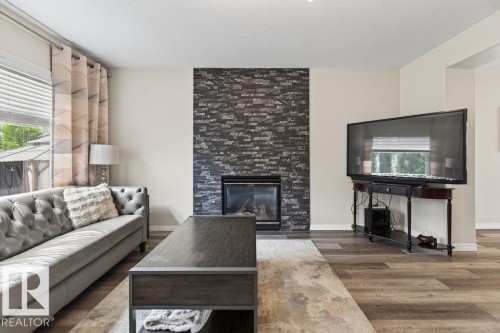20431 57 Avenue Nw, Edmonton, AB - Indoor Photo Showing Living Room With Fireplace
