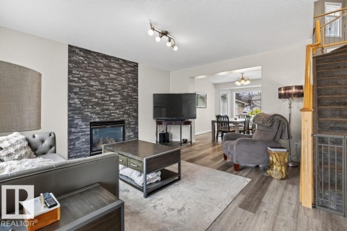 20431 57 Avenue Nw, Edmonton, AB - Indoor Photo Showing Living Room With Fireplace